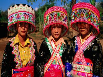 Three Lao Theung women in traditional clothing